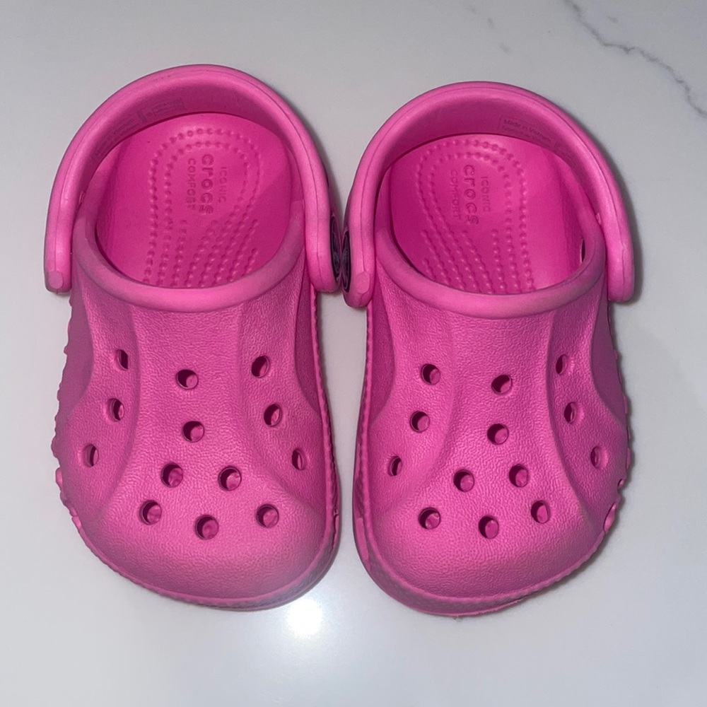 Hot pink Crocs in size 4 C